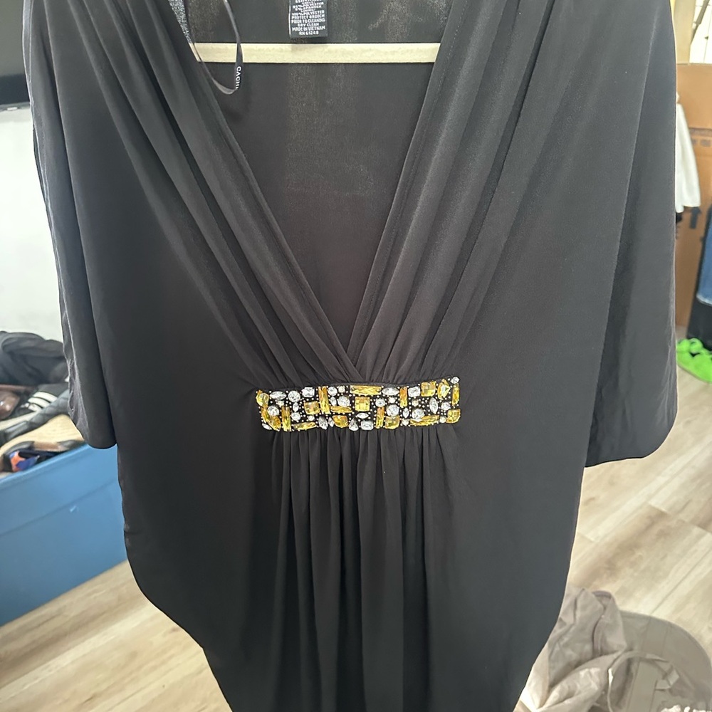 Elegant Black Mini Dress with Embellished Detail